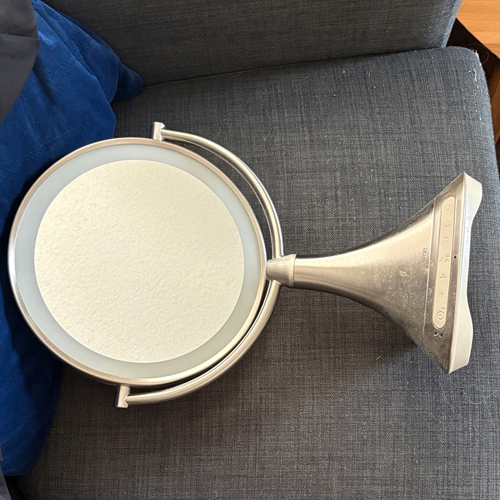 Silver double sided Mirror with LED light rim and built in speakers